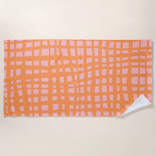 Retro pastel orange and pink grid pattern beach towel