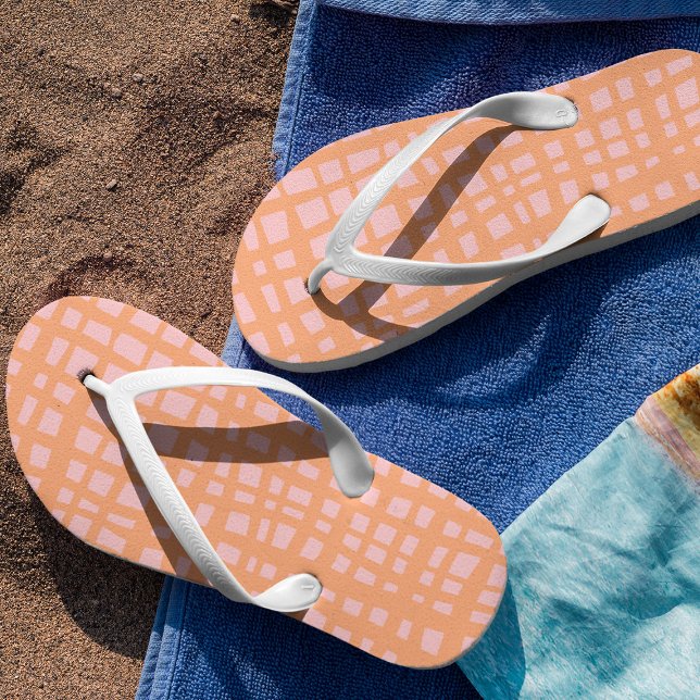 Retro pastel orange and pink grid pattern flip flops (Creator Uploaded)