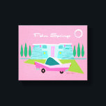 Retro Pink Palm Springs Stretched Canvas Print<br><div class="desc">Between the pink background, turquoise mid century modern home, and the classic 1950s car, this design couldn’t be more Palm Springs if it said it in the clouds. Oh, wait, it does say it in the clouds! The blue and teal stone of the house is offset by the sputnik light...</div>