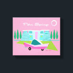 Retro Pink Palm Springs Stretched Canvas Print<br><div class="desc">Between the pink background, turquoise mid century modern home, and the classic 1950s car, this design couldn’t be more Palm Springs if it said it in the clouds. Oh, wait, it does say it in the clouds! The blue and teal stone of the house is offset by the sputnik light...</div>