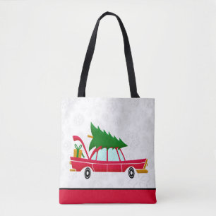 Retro Red Car Carrying a Christmas Tree Tote Bag