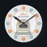 Retro Stove Personalized Kitchen Clock<br><div class="desc">A clock featuring an illustration of a retro beige kitchen stove.  Personalize with your name about illustration.  Clock features white numbers on orange and blue dots.</div>