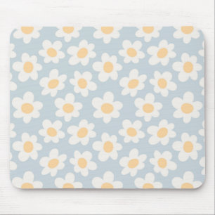 Retro style daisies in bloom on blue background mouse pad
