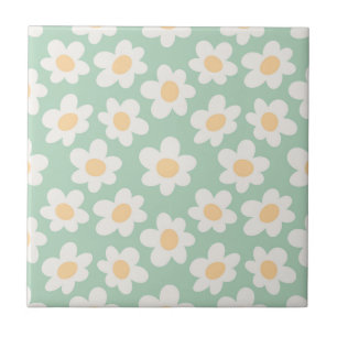 Retro style daisies in bloom on green background tile