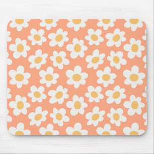 Retro style daisies in bloom on orange background mouse pad