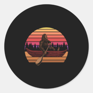 Retro Vintage Bigfoot In Canoe Classic Round Sticker