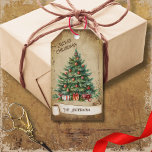 Retro Vintage  Christmas Tree Merry Christmas Gift Tags<br><div class="desc">Beautiful retro vintage illustration of a festive and decorated Christmas tree with gifts on a retro grunge background and frame for an aged or vintage look. Design features a vintage scroll ribbon for your personalization both in the front or the back sides of this elegant, and timeless Holiday Gift Tag....</div>