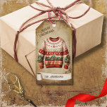 Retro Vintage Ugly Sweater Merry Christmas  Gift Tags<br><div class="desc">Beautiful retro vintage illustration of warm ugly sweater on a retro grunge background and frame for an aged or vintage look. Design features a vintage scroll ribbon for your personalization both in the front or the back sides of this elegant,  and timeless Holiday Gift Tag.</div>