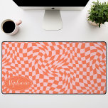 Retro Wave: Modern Wavy Orange Pink Chequerboard Desk Mat<br><div class="desc">Elevate your workspace with this Modern Wavy Chequerboard Pattern Personalized Desk Mat. This mat presents a playful twist on a classic chequerboard, brought to life with an undulating wave pattern in shades of orange and pink. The personalized feature offers an extra touch of individuality, making your workspace truly your own....</div>