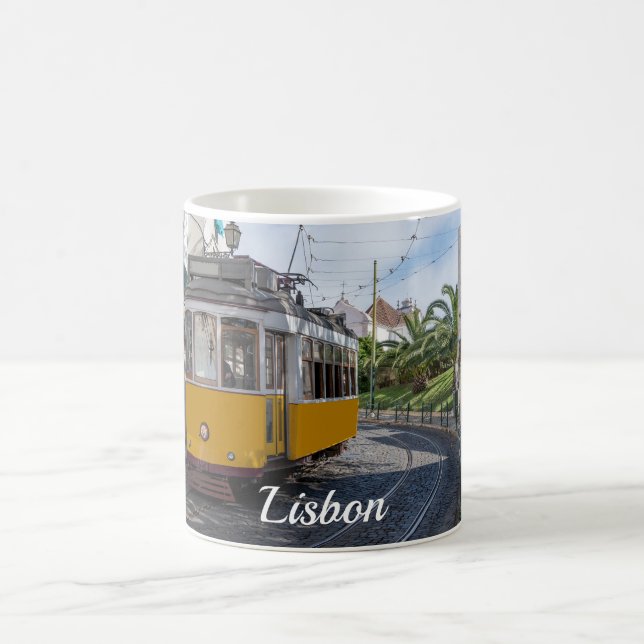 Retro yellow tram on street in Lisbon, Portugal Coffee Mug (Center)