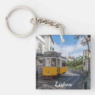 Retro yellow tram on street in Lisbon, Portugal Keychain