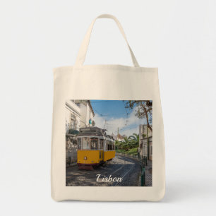 Retro yellow tram on street in Lisbon, Portugal Tote Bag