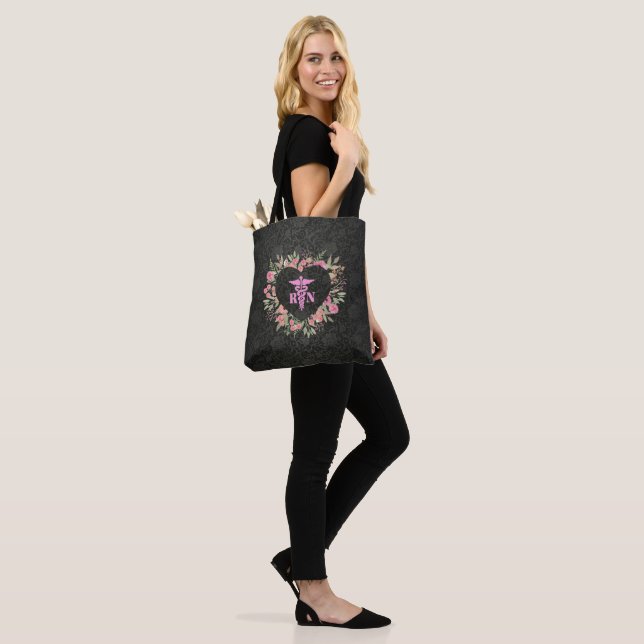 Reusable floral heart shopping bag for nurse (On Model)
