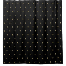 Crânes d'or sur le noir