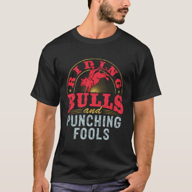 Riding Bulls And Punching Fools Funny Rodeo Bull R T-Shirt (Front)