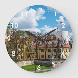 Riga Castle during sunny day in Riga, Latvia Large Clock