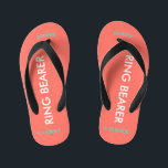 Ring Bearer NAME Coral Kid's Flip Flops<br><div class="desc">Ring Bearer is written in white text against bright coral colour with black accents. Name and Date of Wedding is turquoise blue. Personalize your little ring bear boy's name in arched uppercase letters. Click Customize to increase or decrease name size to fall within safe lines. Fun beach destination flip flops...</div>