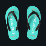 Ring Bearer NAME Turquoise Blue Kid's Flip Flops<br><div class="desc">Ring Bearer is written in white text against bright happy turquoise blue colour with black accents. Name and Date of Wedding is in coral text. Personalize your little ring bear boy's name in arched uppercase letters. Click Customize to increase or decrease name size to fall within safe lines. Fun beach...</div>
