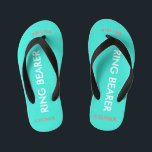 Ring Bearer NAME Turquoise Blue Kid's Flip Flops<br><div class="desc">Ring Bearer is written in white text against bright happy turquoise blue colour with black accents. Name and Date of Wedding is in coral text. Personalize your little ring bear boy's name in arched uppercase letters. Click Customize to increase or decrease name size to fall within safe lines. Fun beach...</div>