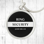 Ring Security Ring Bearer  Keychain<br><div class="desc">Make your ring bearer feel like a secret agent with this stylish black and white "Ring Security" keychain. The design features a sleek, agent style design that is sure to impress. Perfect for weddings, this button adds a fun and unique touch to your special day. With its trendy and stylish...</div>