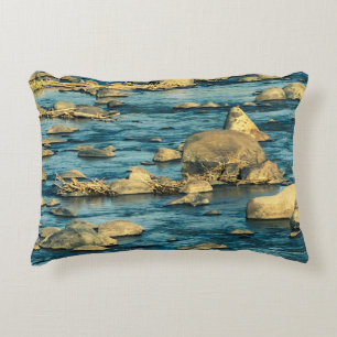 River rocks on the water with sunlight scenery accent pillow