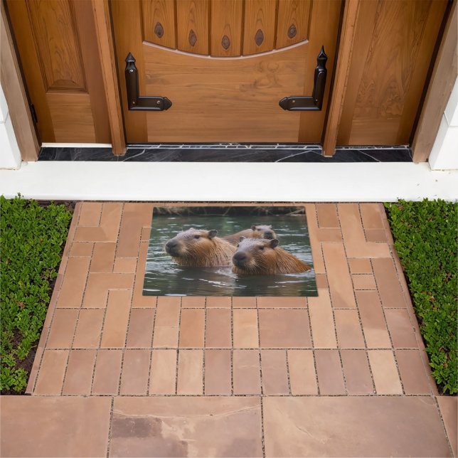 "River Serenity: Capybaras Swimming in the Flow" Doormat (Outdoor)