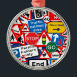 Road Signs Metal Ornament<br><div class="desc">These colorful road signs from the United Kingdom, look so good against a Union Jack flag background, great gifts for which young people and probably the men folk will specially enjoy. Why not give a gift to new drivers, as a little reward for passing their text, and a reminder to...</div>