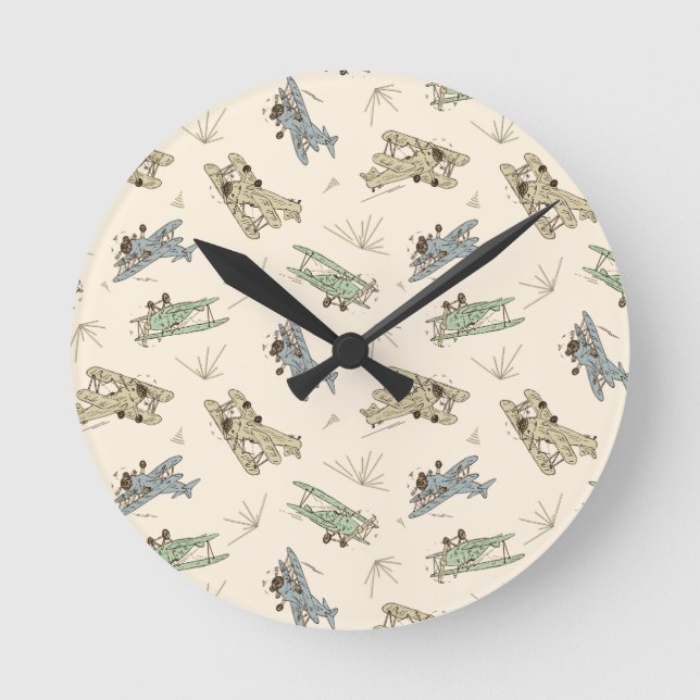 Roaring Art Deco Bi-planes - blue green pattern.   Round Clock (Front)