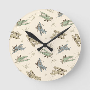 Roaring Art Deco Bi-planes - blue green pattern. Round Clock