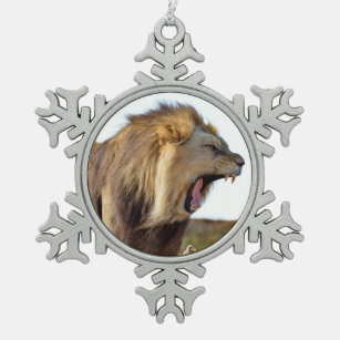 Roaring lion full of teeth  snowflake pewter christmas ornament