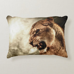 Roaring lioness against stormy sky accent pillow