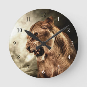 Roaring lioness against stormy sky round clock