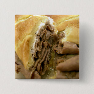 Roast beef sandwich with creamy goat cheese 2 inch square button