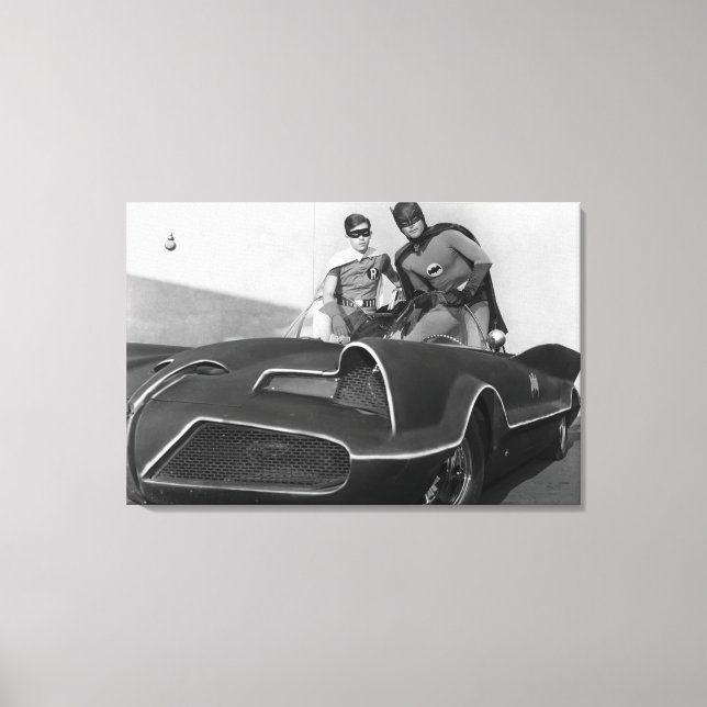 Robin and Batman Standing in Batmobile Canvas Print (Front)