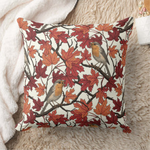 Robins in maple tree on off white throw pillow