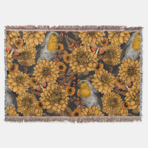 Robins in the autumn garden on black throw blanket