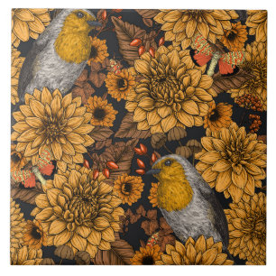 Robins in the autumn garden on black tile