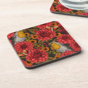 Robins in the autumn garden, red dahlias on black coaster