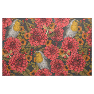 Robins in the autumn garden, red dahlias on black fabric