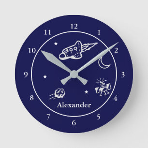 Rocket in Space Dark Blue and White with Name Round Clock