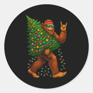 Rockin Christmas Bigfoot Carrying Tree Fun Xmas Ro Classic Round Sticker