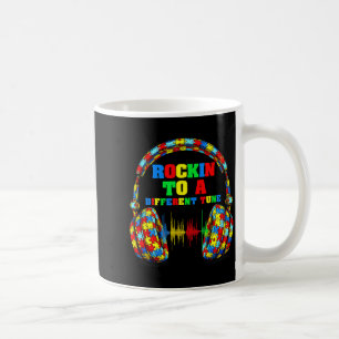 Rockin to a different tune autism awareness vibe coffee mug