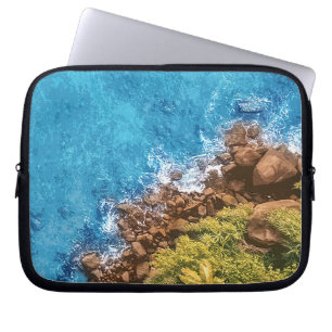 Rocks in the sea, above view 1 laptop sleeve