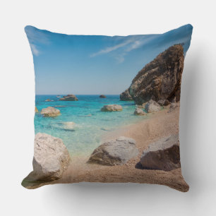 Rocks on Cala Mariolu beach on Sardinia, Italy Throw Pillow
