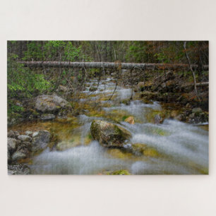 Rocky forest creek with motion blur water jigsaw puzzle
