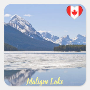 Rocky mountains reflecting in Maligne Lake Square Sticker