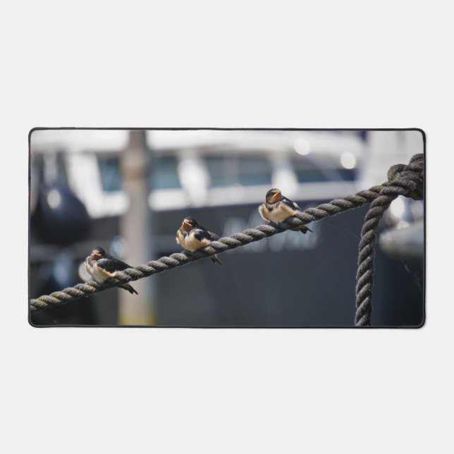 Rolled birds on a line in the port desk mat (Front)