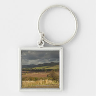 Rolling Hills And Mountains Under A Cloudy Sky Keychain