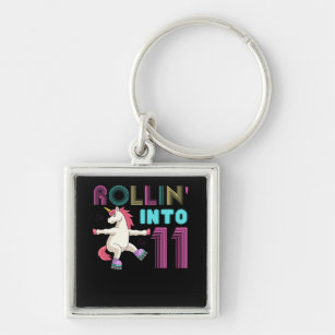 Rolling into 11 - roller scate unicorn keychain