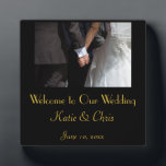 Romantic and Elegant Wedding Couple Holding Hands Plaque<br><div class="desc">Welcome to our wedding plaque. A romantic and elegant wedding photograph of a couple holding hands. The image focuses on the couples hands clasped together in love,  while wearing their fancy wedding attire. She in her wedding gown and he in his tux. Personalize with your own wedding details.</div>